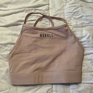 Nobull heather light pink melange high neck sports bra. Size extra small.